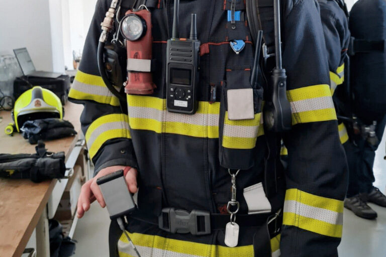 Firefighter with ppt radio and tracker