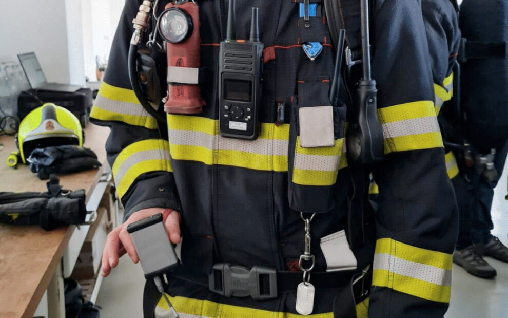 Firefighter with ppt radio and tracker